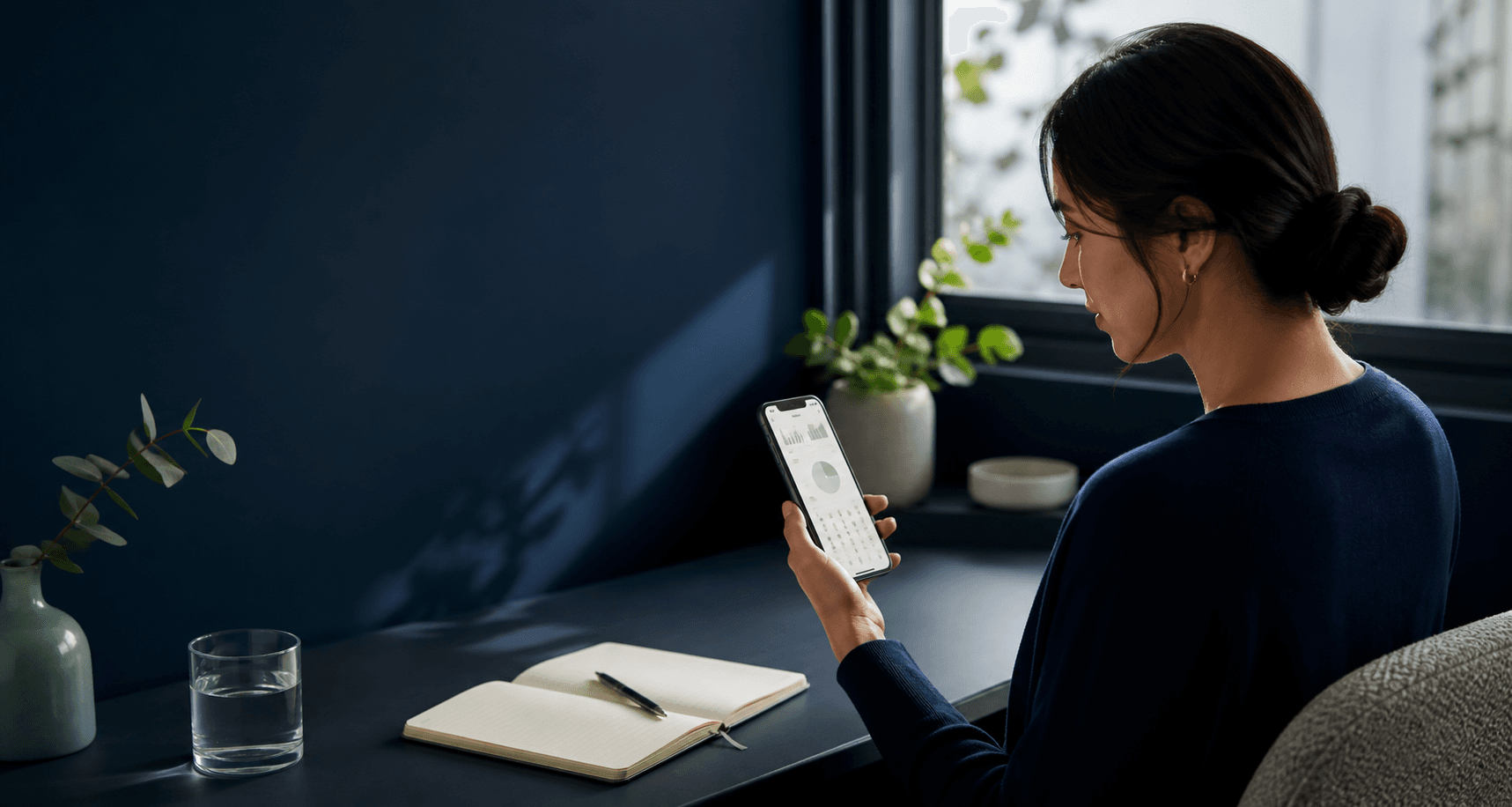 Person using a migraine tracking app on a phone